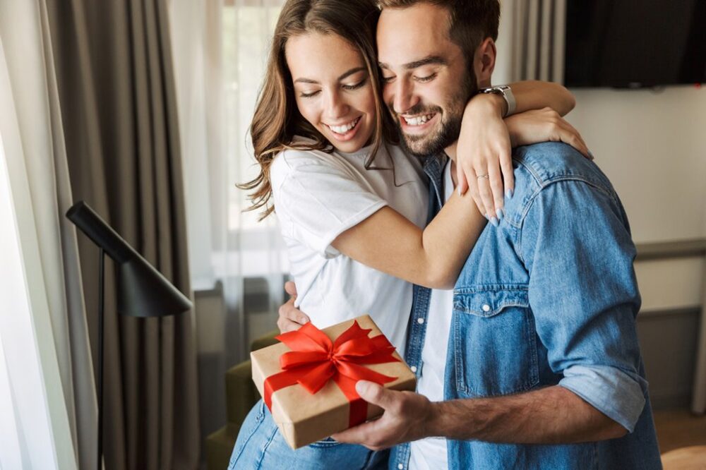 Beautiful Young Couple In Love At Home